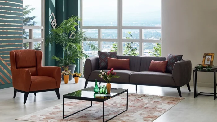 Lofty Sitzgarnitur, orange sessel und grau sofa